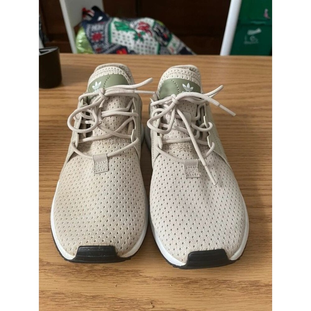 Woman’s beige adidas ortholite sneakers